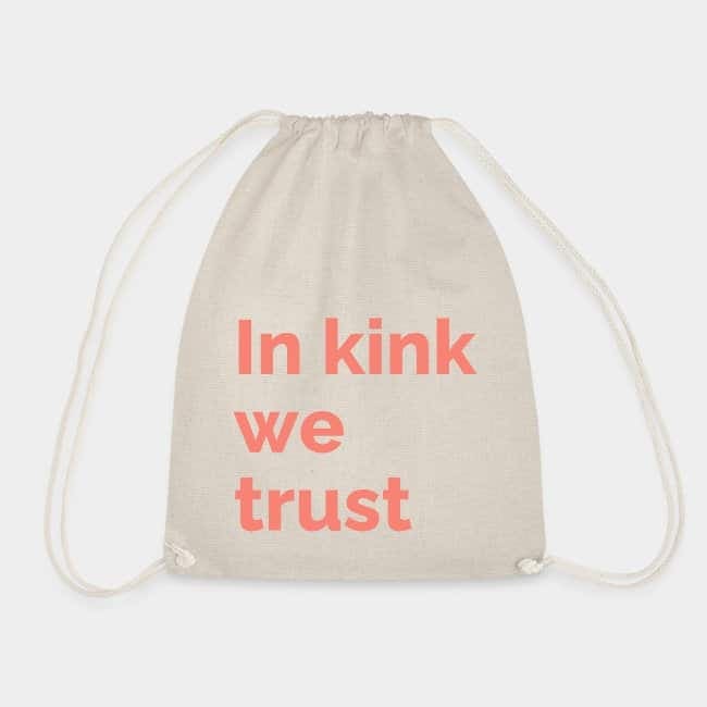Natural-coloured drawstring bag printed with “In kink we trust” in coral lettering