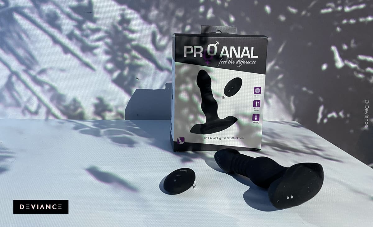 Pro-Anal anal plug in its packaging on the "Guy Rider" doll.